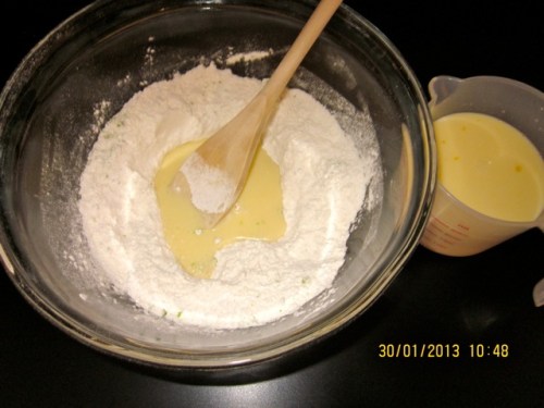 Slowly pour egg mixture into the well Banana Pancakes_4123