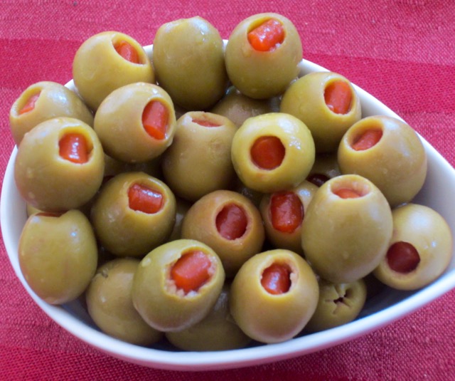 What are stuffed olives? myfavouritepastime.com: Green Spanish olives stuffed with red pimiento peppers